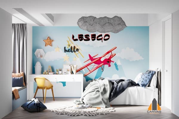 Biplane custom wallpaper in a child's bedroom with a cloud light fixture and white bed.