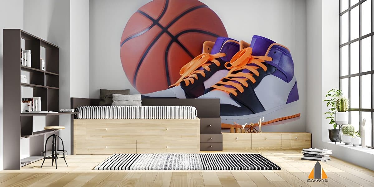 Large basketball and sneakers wall mural in a child's bedroom with shelving and wooden bed.
