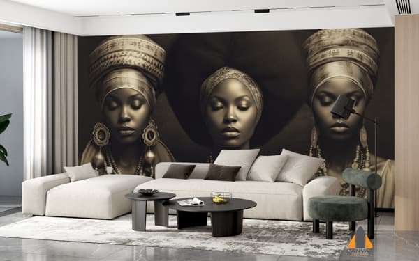 Three women in headwraps wall mural in a modern living room, expertly installed by Canvas & Wall.