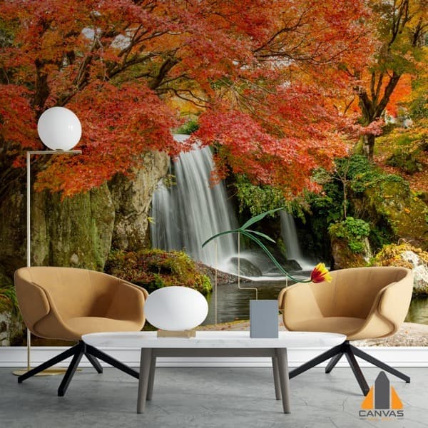 Vibrant autumn waterfall wall mural in a modern living room setting.