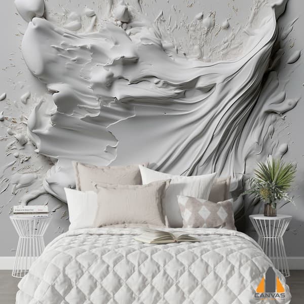 White abstract textural wall mural behind a bed with neutral pillows, perfect for wallpaper installations.