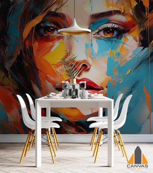 Vibrant abstract woman's face wall mural in a modern dining room, ideal for a custom wallpaper installation.