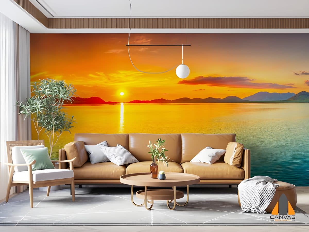 Vivid sunset ocean wall mural in a modern living room with brown sofa and light wood furniture