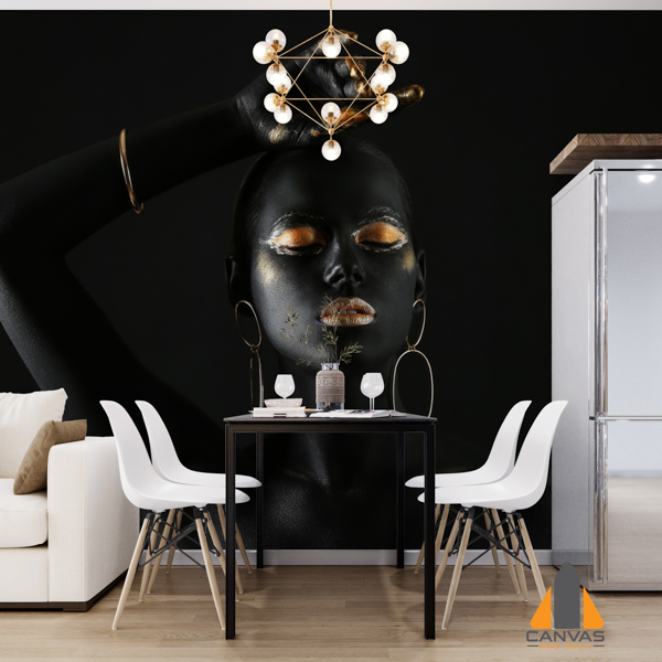 Black woman with gold lips and finger tips