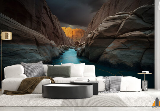 river-flows-through-canyon-with-mountains-background